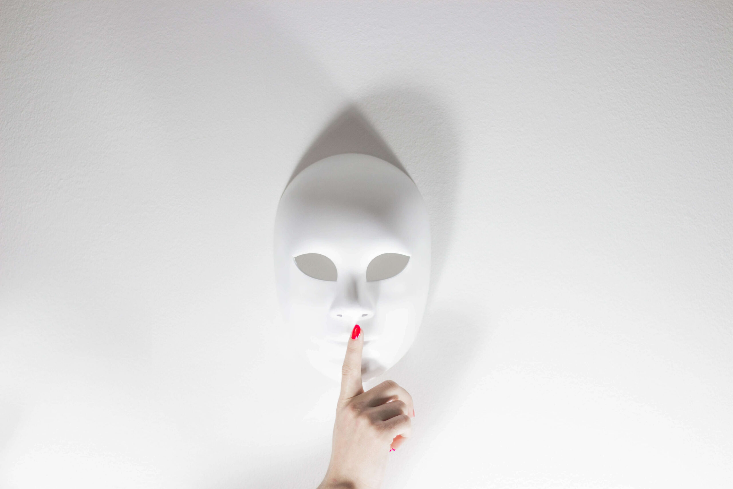 A blank mask representing the hidden feeling of imposter syndrome
