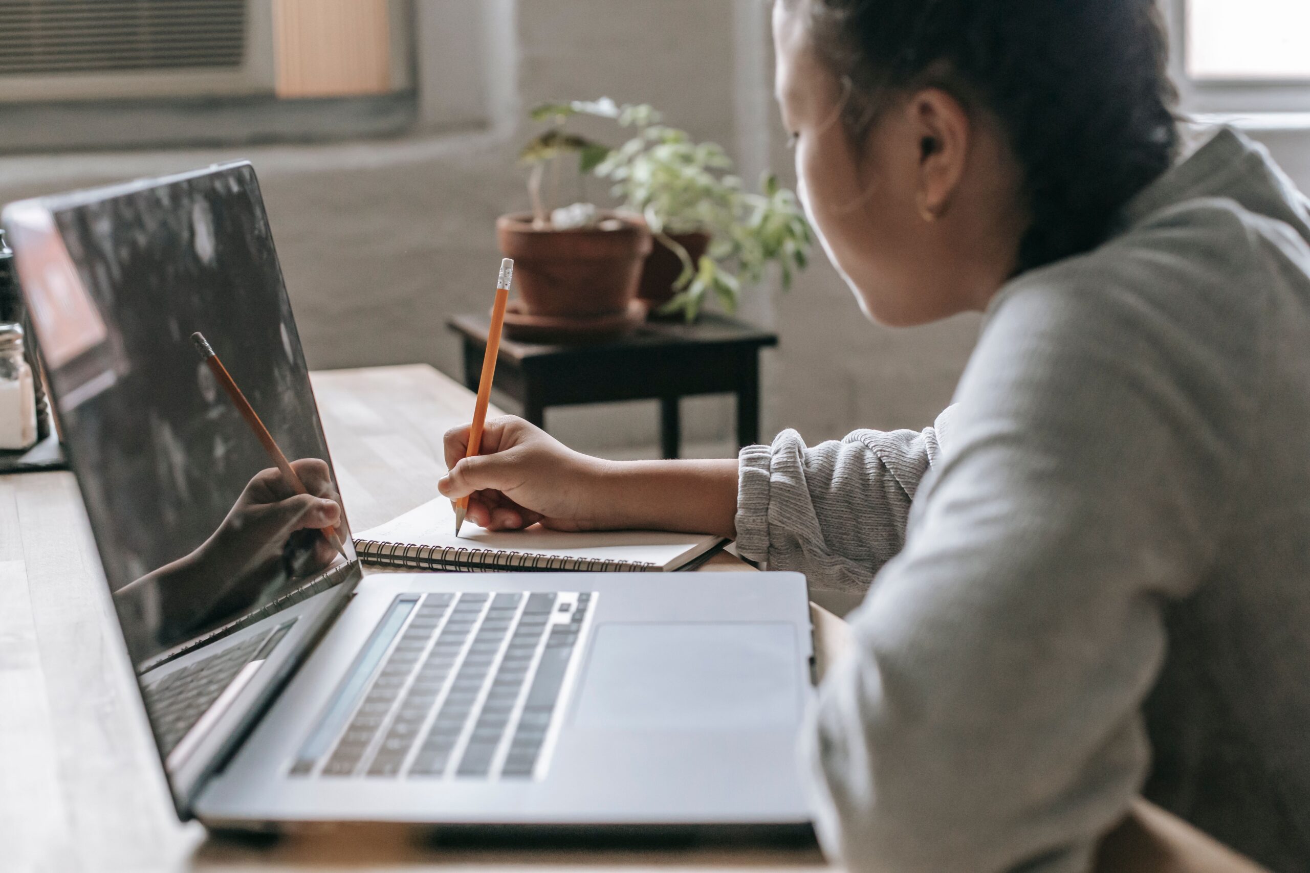 A person researching how to choose the right therapist on a laptop