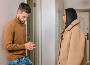 Two partners talking calmly as one prepares to suggest couples therapy