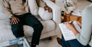 A therapist and client planning steps in exposure therapy