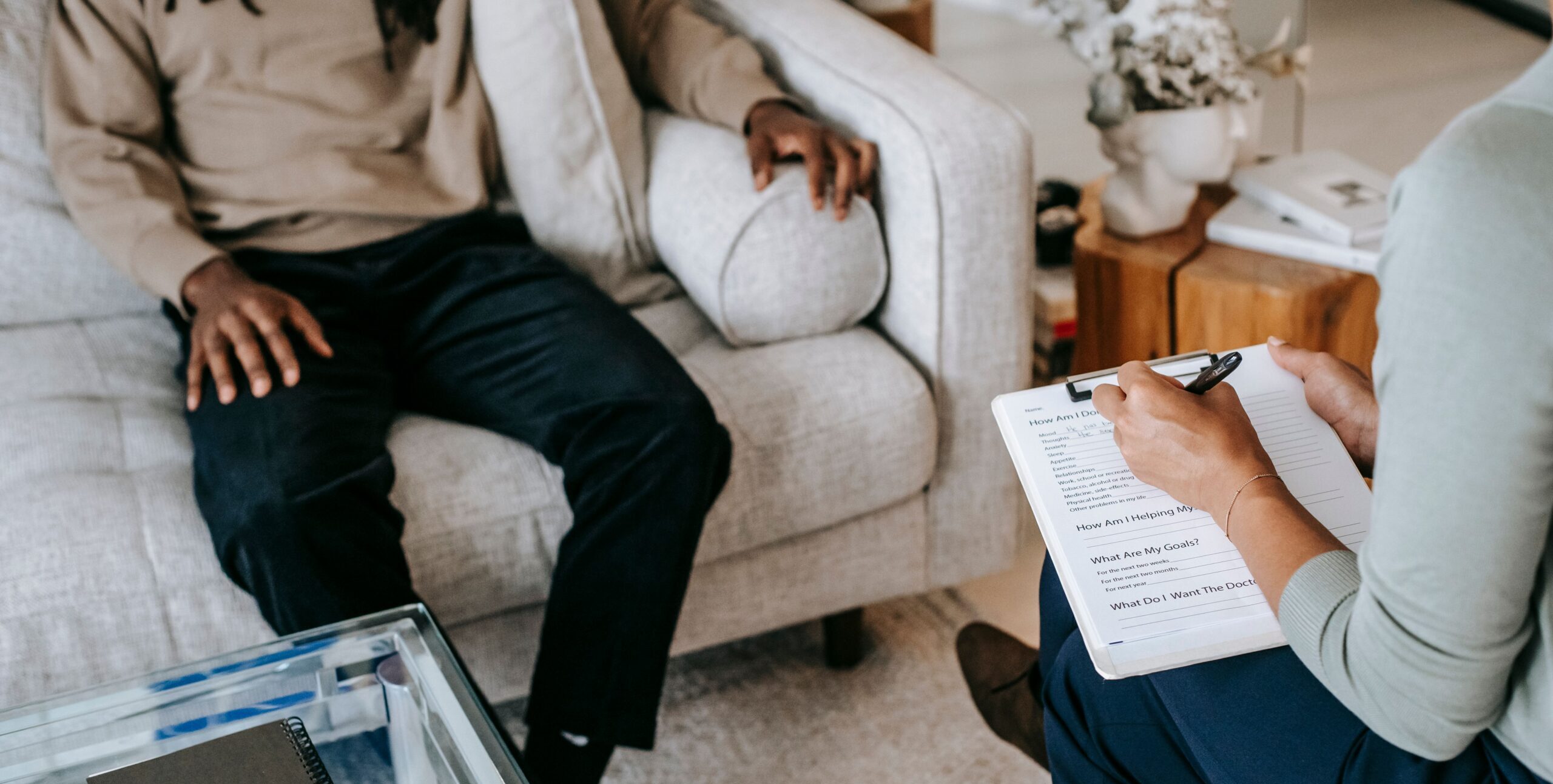 A therapist and client planning steps in exposure therapy